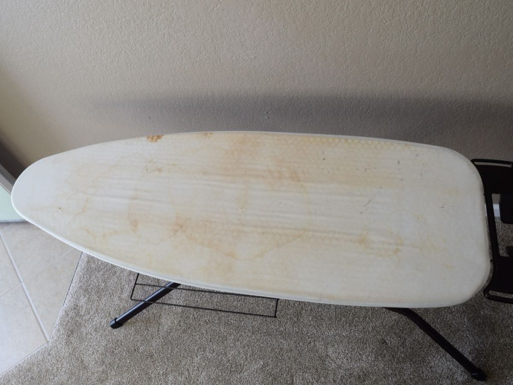 Stained and scorched ironing board cover